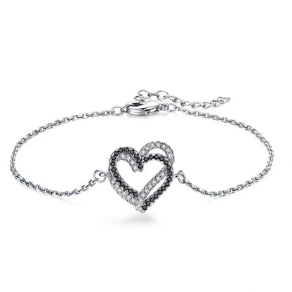 Elegant Titanium Steel Heart Bracelet for women, featuring a delicate heart design.