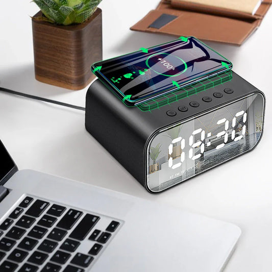 Versatile wireless charging Bluetooth speaker alarm clock with LED display, compact and sleek design.