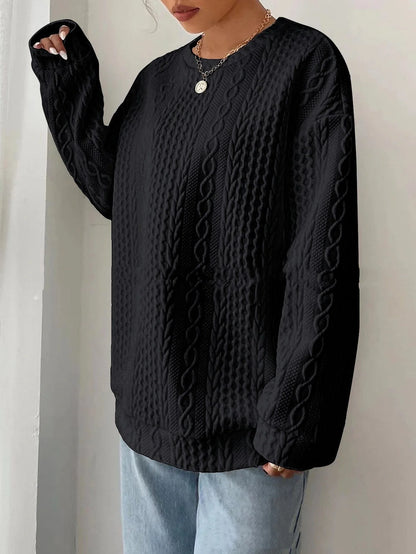 Cosy and stylish women's oversized jacquard hoodie in black, white, and blue colours