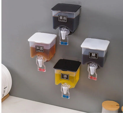 Wall-mounted condiment bottles in white and black, featuring press handle for easy pouring