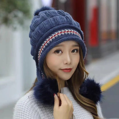 Knit fleece beanie with ear flaps and pompom in various colours for winter warmth