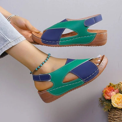 Stylish wedge sandals with a colourful cross-strap design for women's summer fashion