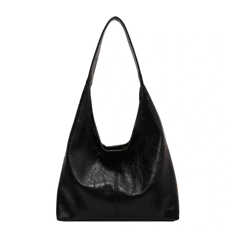 Elegant vintage designer women's shoulder bag in various colours