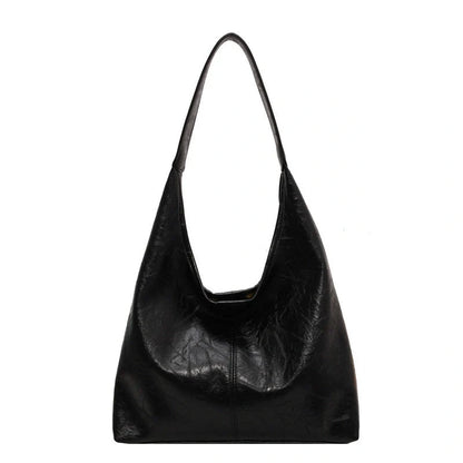 Elegant vintage designer women's shoulder bag in various colours