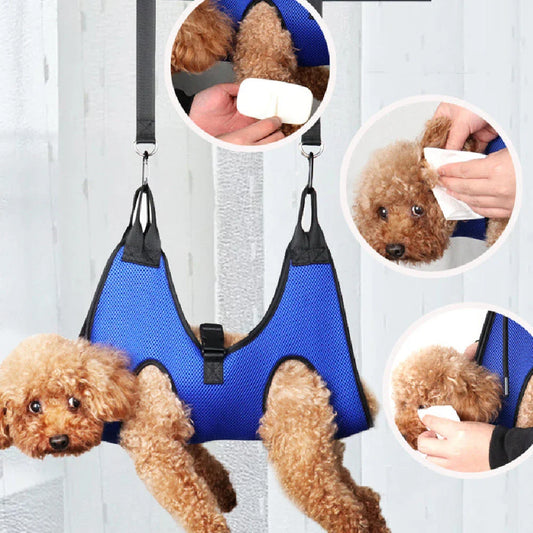 Adjustable pet grooming hammock with straps, buckles, comb, and nail clipper for convenient nail trimming and bathing of cats and dogs