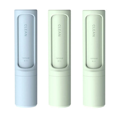 Rotating cylinder electrostatic pet hair remover brush in white, blue, green, and pink