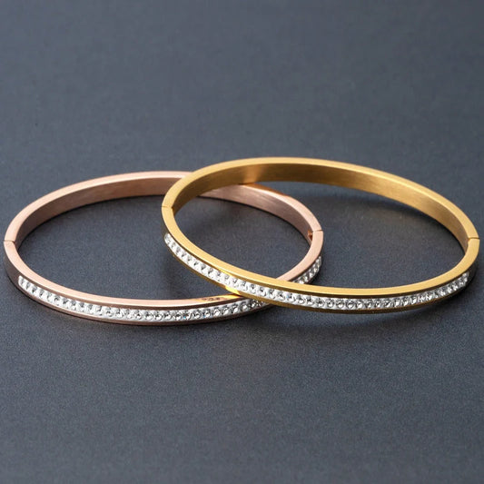 Single row stainless steel bracelet with diamond opening in gold, rose gold, or steel colour