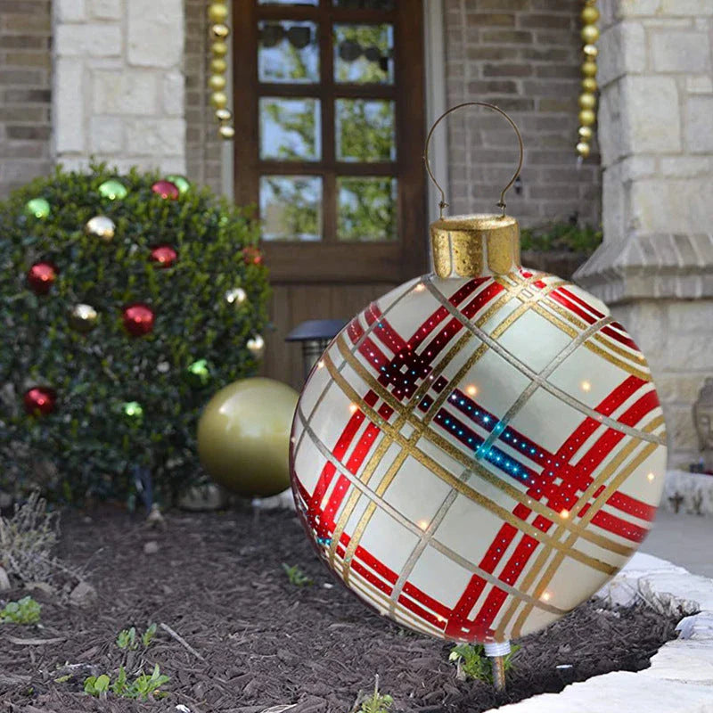 Inflatable Christmas baubles in various festive designs for outdoor holiday decoration