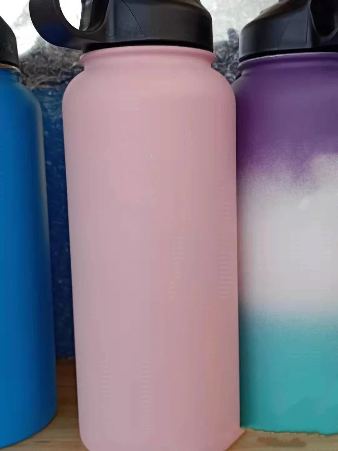 Premium stainless steel insulated tumbler with push-button lid and sleek design for outdoor adventures and active lifestyles.