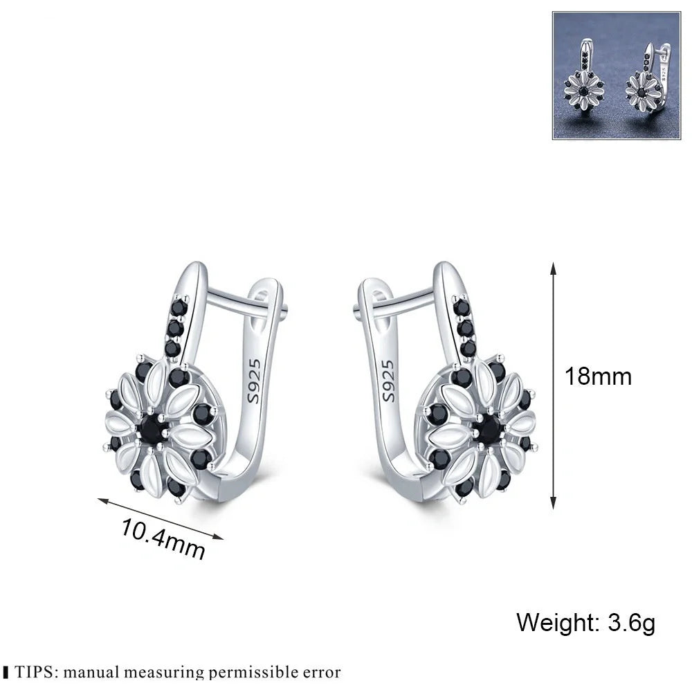 Elegant copper flower earrings with sparkling zircon accents, perfect for any occasion.
