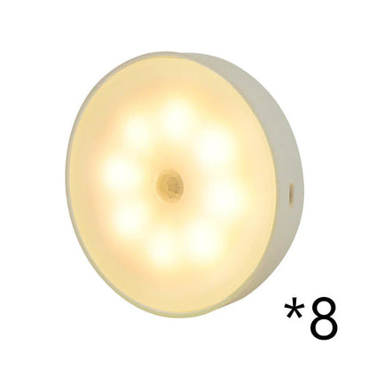 Motion-activated LED puck lights in warm and white color options, with various pack sizes and USB recharging