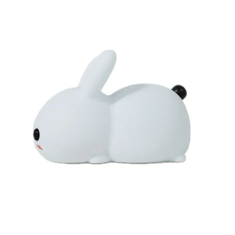 Soft, rabbit-shaped silicone LED night light with dimmable, dual-tone lighting for UK children's bedrooms