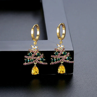 Pair of elegant Christmas tree earrings with a geometric design, sparkling rhinestones, and 18K gold electroplating