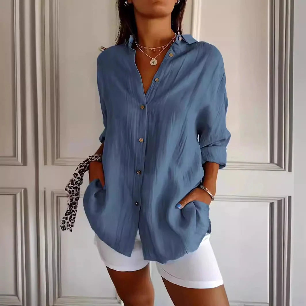 A stylish long-sleeved shirt with a pleated design, available in a variety of colours to suit any occasion.