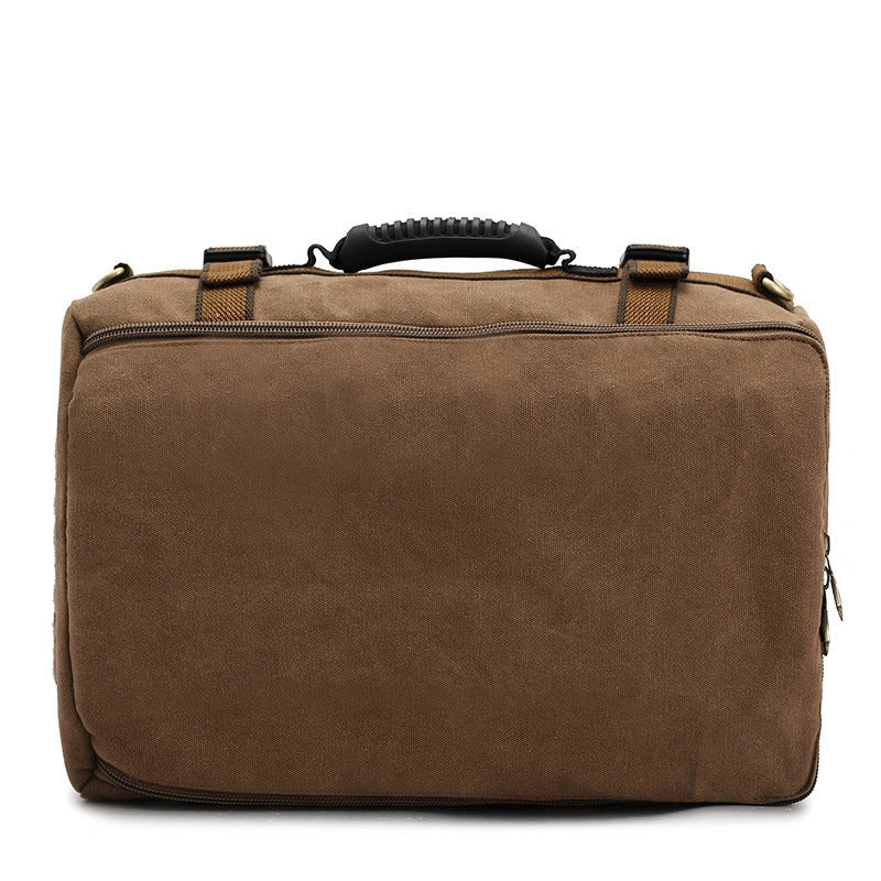 Men's canvas backpack with reinforced handle and multiple pockets