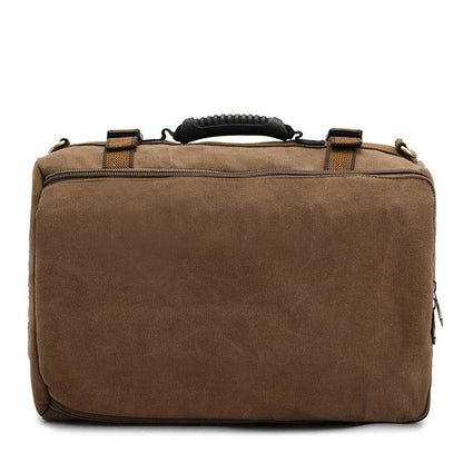 Men's canvas backpack with reinforced handle and multiple pockets