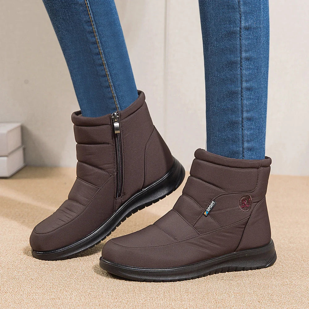 Women's waterproof snow boots in red, black, and brown with non-slip soles
