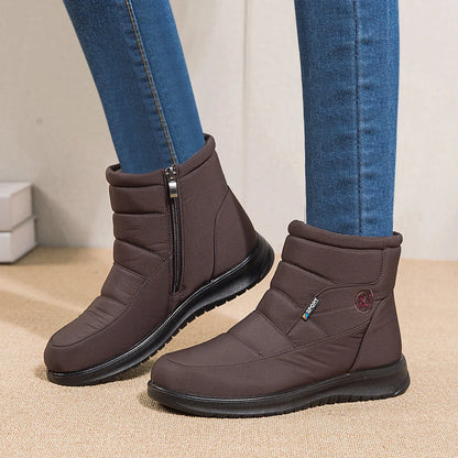 Women's waterproof snow boots in red, black, and brown with non-slip soles