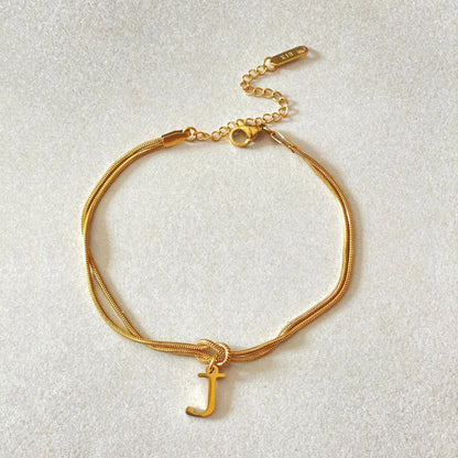 Personalised gold and silver love knot bracelets for couples, perfect as Valentine's Day gifts.