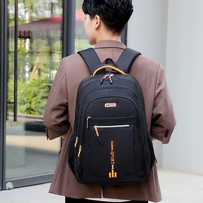 Men's large capacity anti-theft computer backpack in green, blue, black, and orange