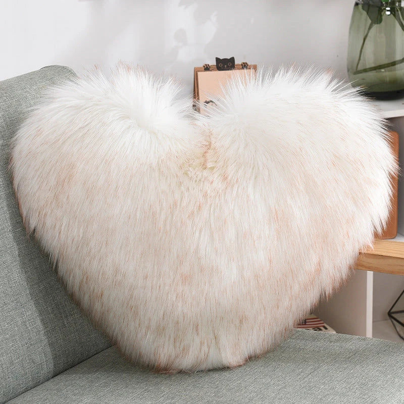 Cozy heart-shaped throw pillow with plush, shaggy texture in various colors