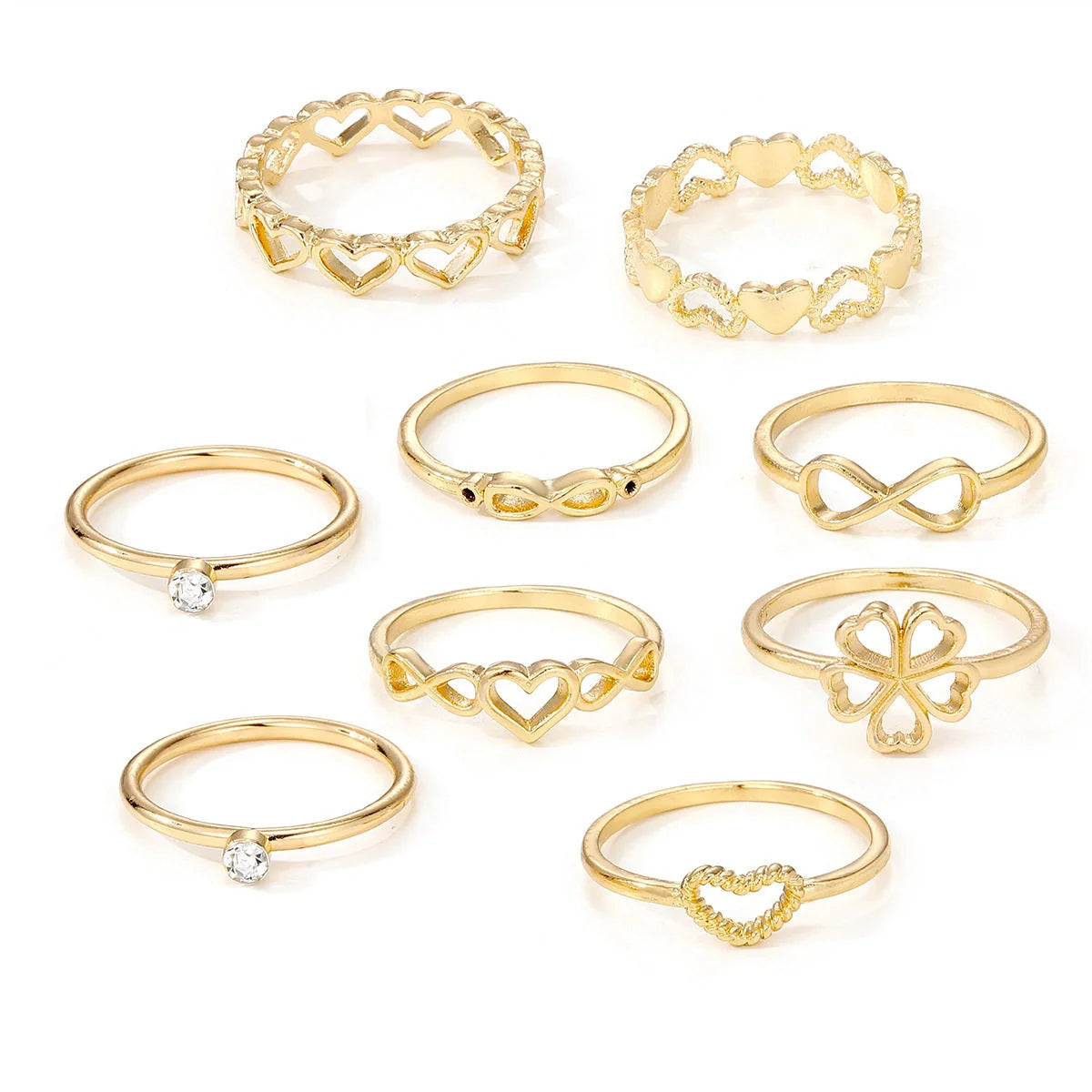 Gold-coloured heart-shaped, geometric, and butterfly design rings set