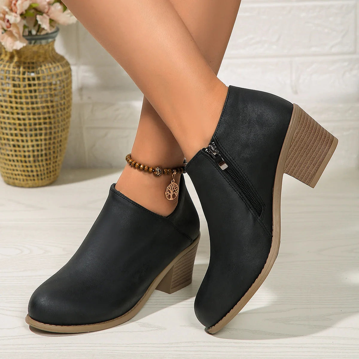 Women's chunky heel ankle boots with side zipper in navy blue, black, and khaki