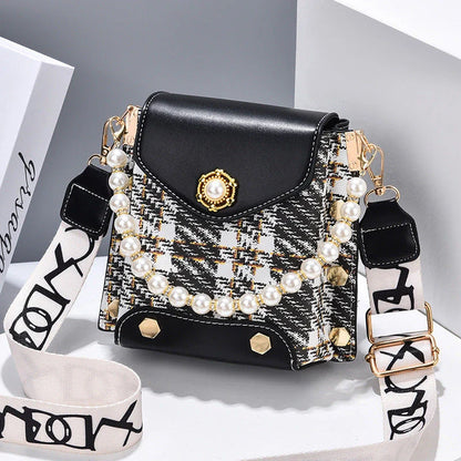 Premium crossbody phone bag with elegant pearl charm, made of durable PU leather and available in multiple color options