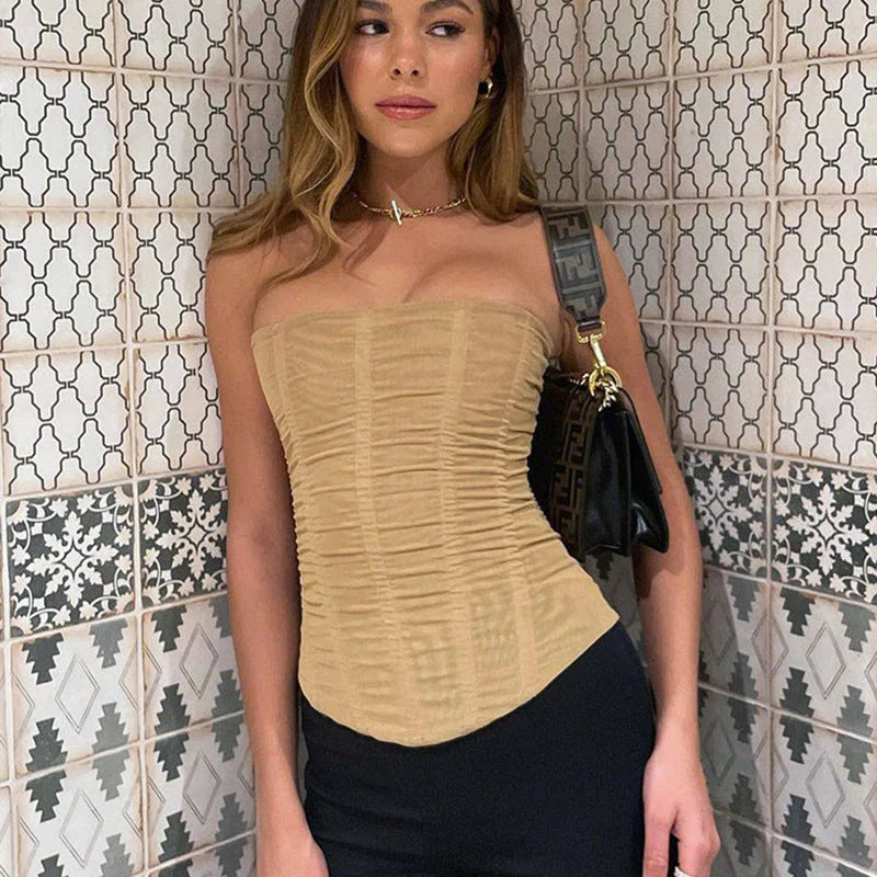 Versatile sleeveless crop corset tank top for women in various colors and sizes, featuring a unique backless, gauze-inspired design for a contemporary, fashionable look.