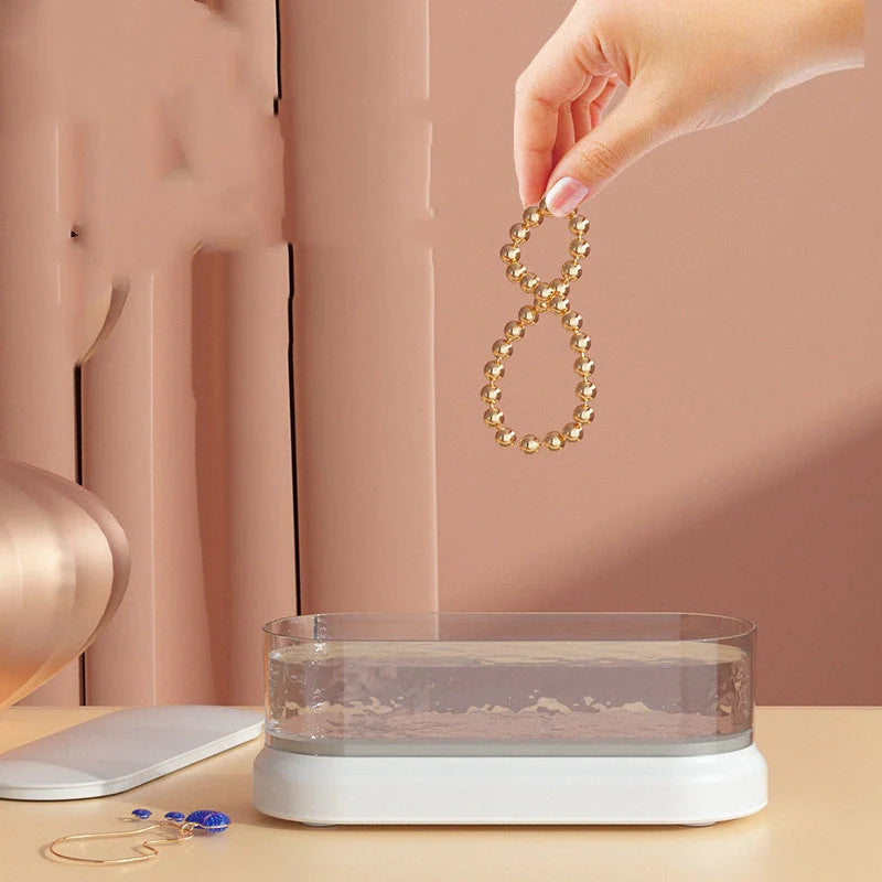 Compact ultrasonic cleaning machine for watches and small items