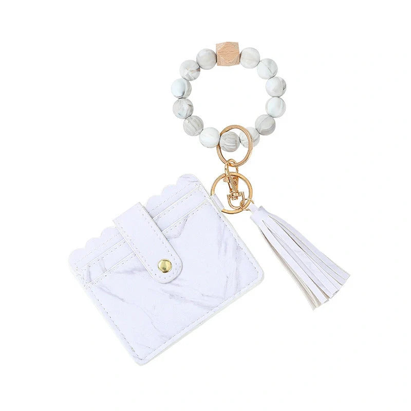Women's silicone beads and PU tassel bracelet keychain in various colours
