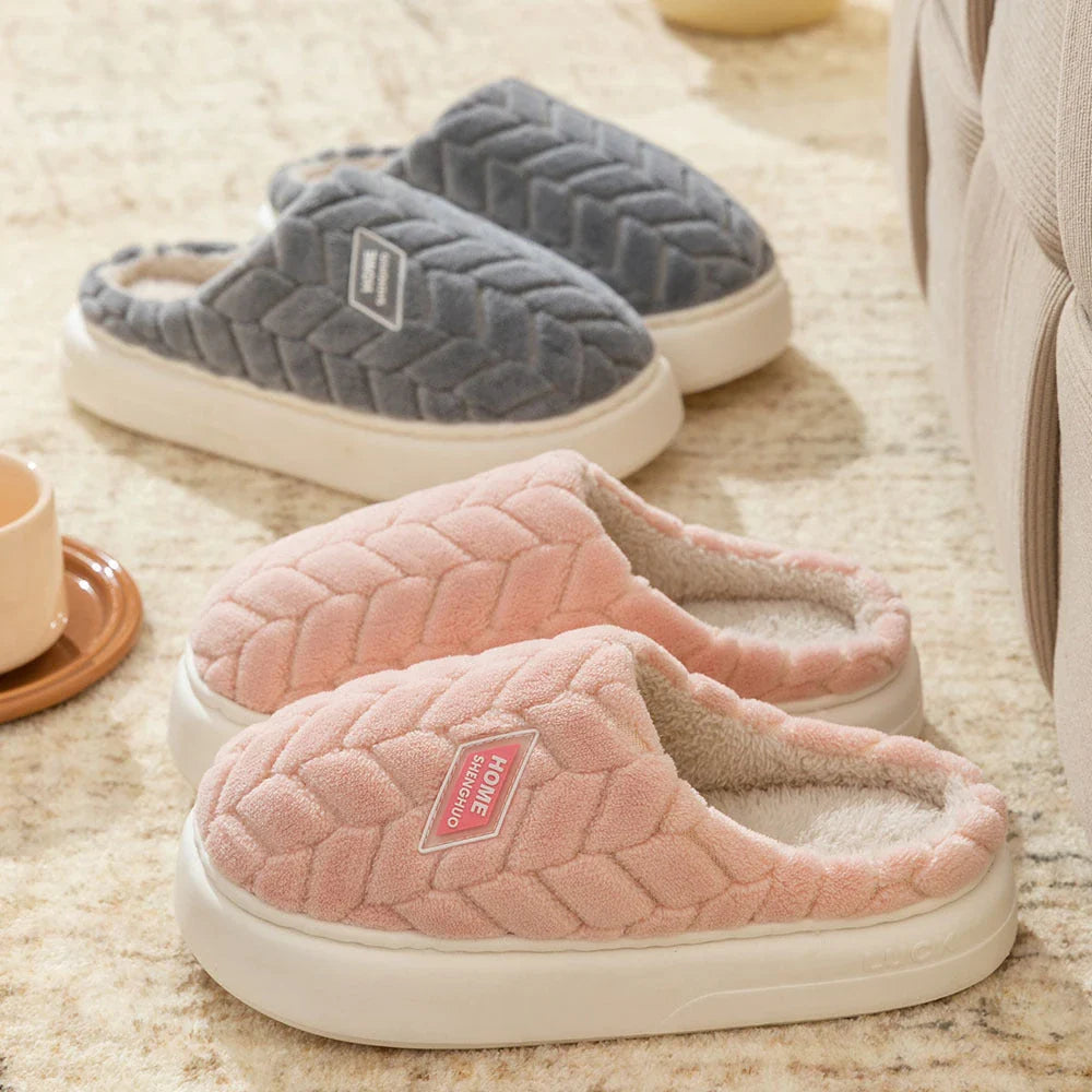 Cosy plush slippers in a variety of vibrant colours, featuring a soft fleece lining and durable non-slip sole for maximum comfort and stability.