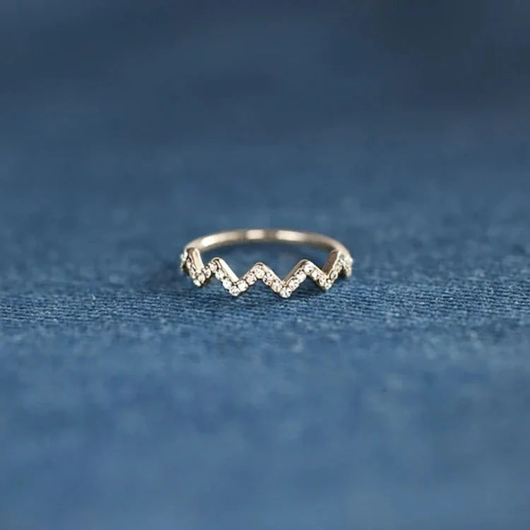 Adjustable wave pattern zircon ring in 925 silver with gold or silver electroplated finish