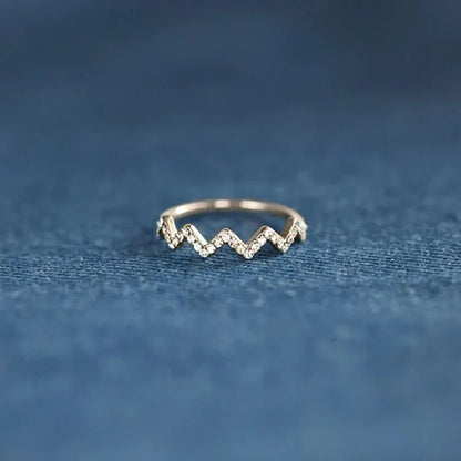 Adjustable wave pattern zircon ring in 925 silver with gold or silver electroplated finish