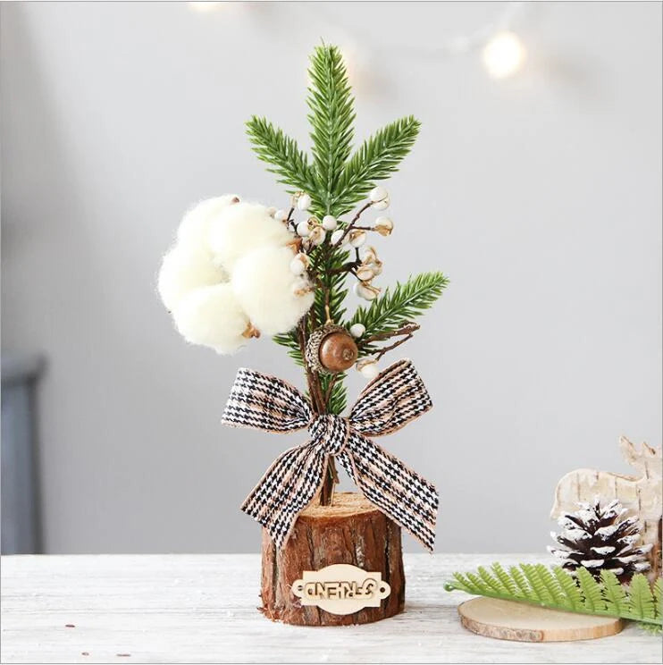 Artificial Christmas tree with red berries and flocked snow effect, 25cm in height