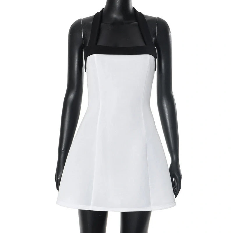 Black and White Halter Mini Dress with contrast colour design, A-line skirt, and sleeveless fit for spring and summer wear.
