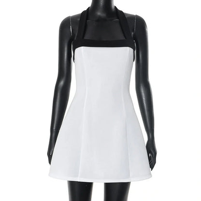 Black and White Halter Mini Dress with contrast colour design, A-line skirt, and sleeveless fit for spring and summer wear.