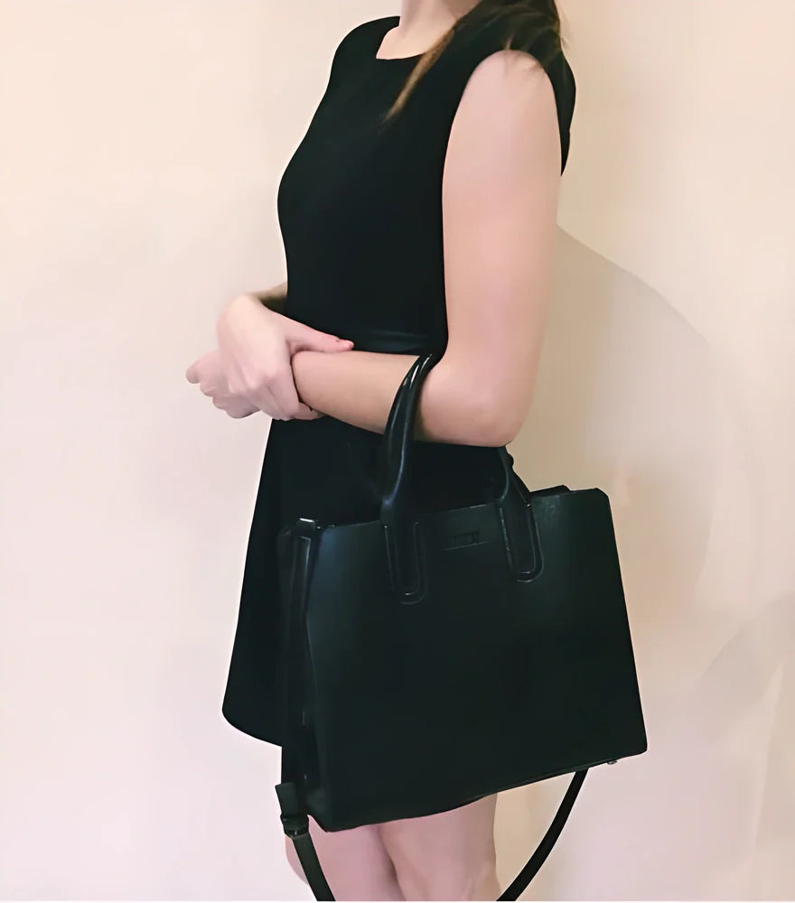 Premium leather tote bag in various colours, featuring a spacious interior, adjustable shoulder strap, and durable PU leather construction