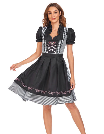 Traditional Oktoberfest ethnic dress for women in vibrant red denim with apron and ribbon