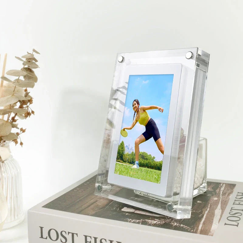 Stylish digital picture frame with acrylic exterior, supporting full HD video playback, automatic content recognition, and dual-speaker audio system
