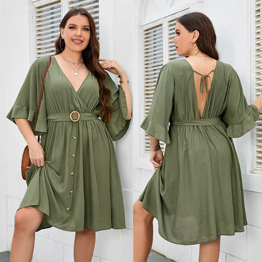 Plus-size green party skirt with V-neck and ruffle sleeves