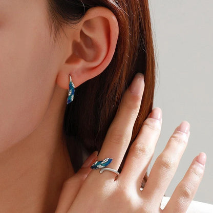 Bright blue feather earring and ring set in alloy with geometric design