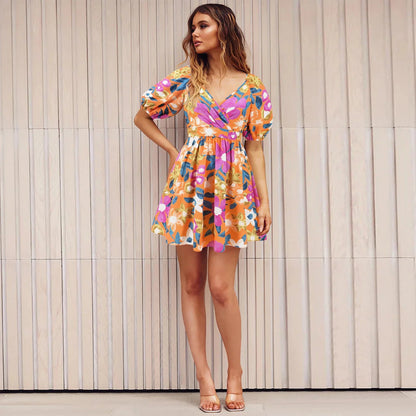 Stylish floral dress with V-neck and lantern sleeves, perfect for summer vacations and warm-weather occasions
