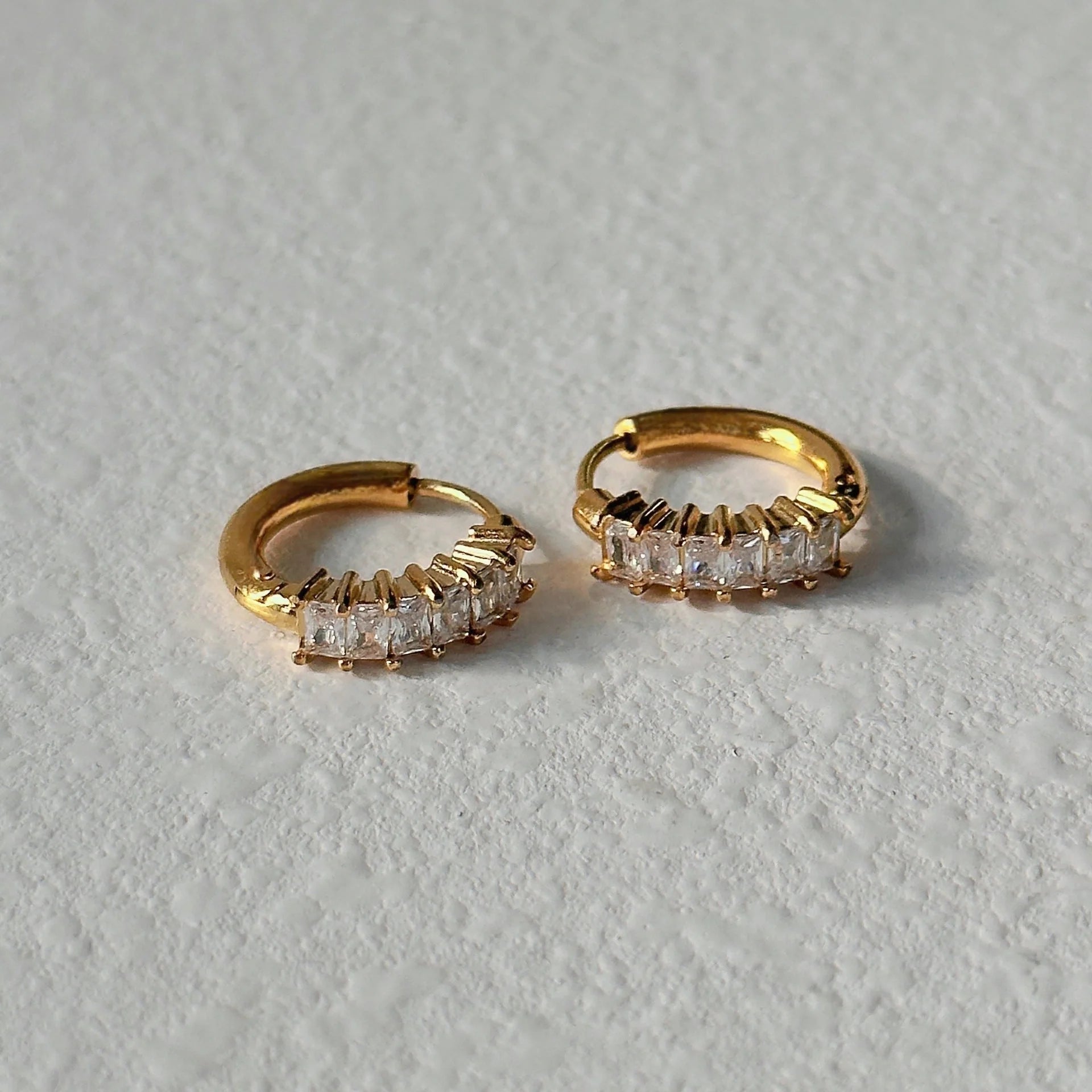 Retro titanium steel zircon earrings with flower design in gold