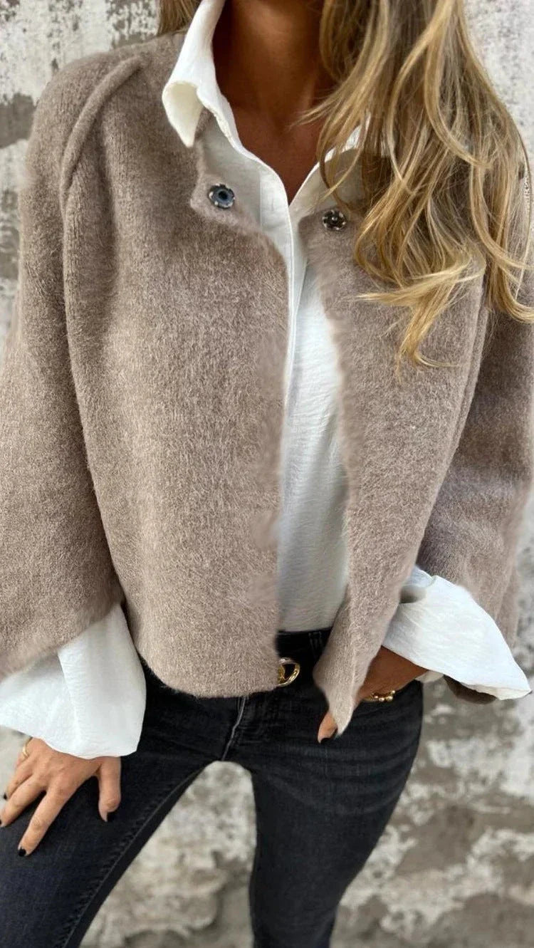 A stylish and comfortable batwing sleeve cardigan made with luxurious imitation cashmere fabric, available in a variety of colors.