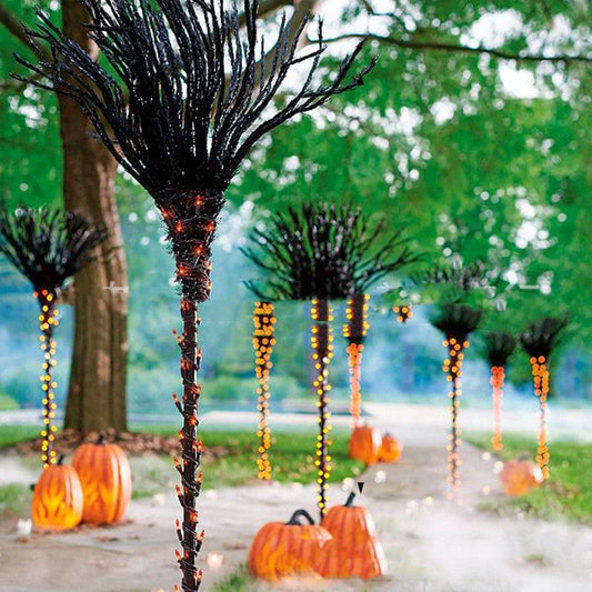 Halloween pre-lit broom with orange mini lights for spooky venue decoration