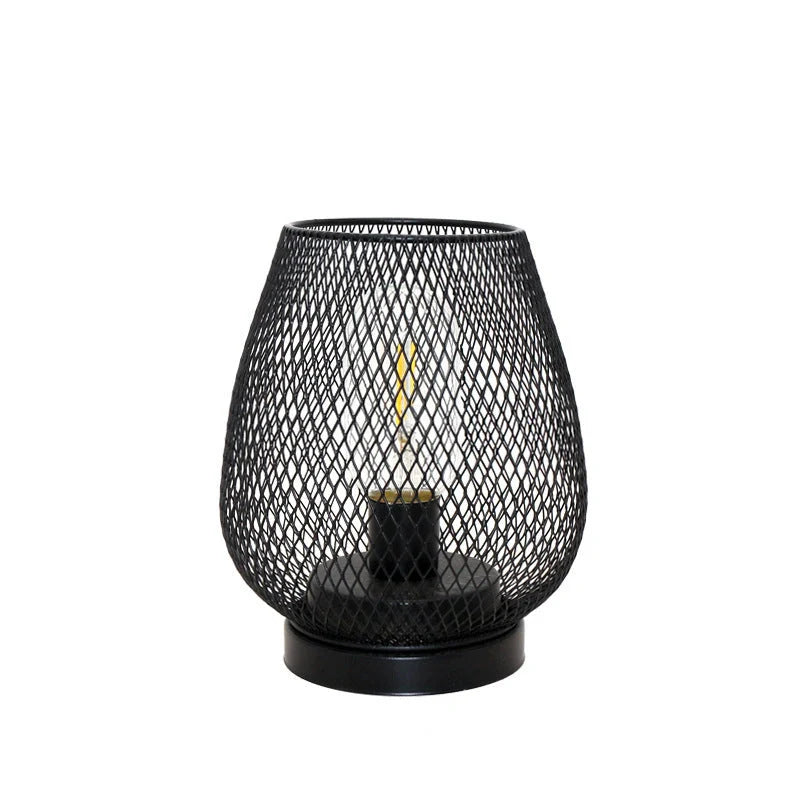 Retro iron art table lamp with hollowed out birdcage design and glass shade