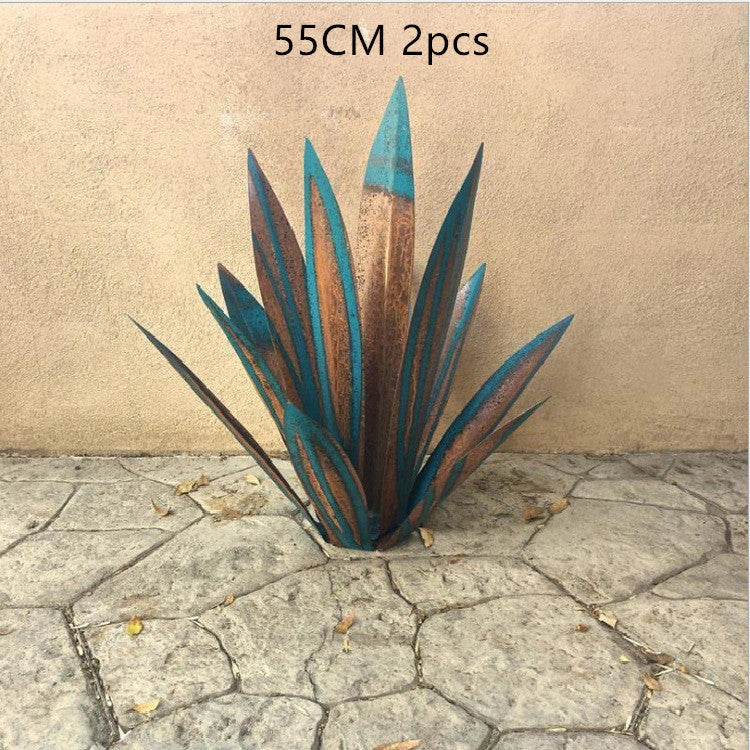 Handmade tequila agave metal sculpture in rustic finish with blue highlights