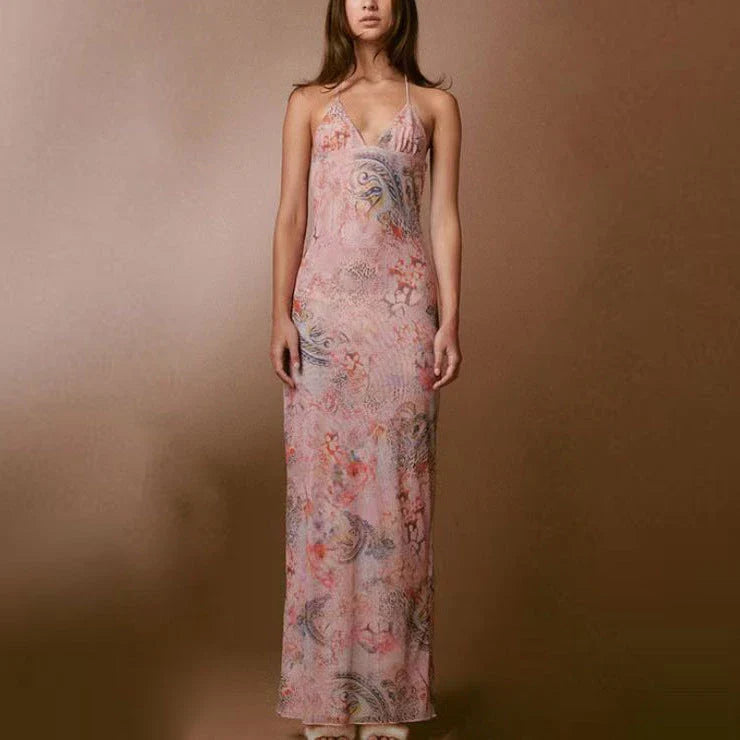 Stylish floral halter dress with spaghetti straps and butterfly back design, available in various vibrant colors