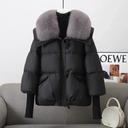 Premium down-filled puffer jacket with faux fur collar, available in brown, black, and white colours